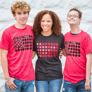 Teen's and young adults wearing God’s forgiveness shirt.